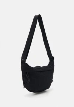 The North Face NEVER STOP CROSSBODY UNISEX - Cross Body Bag - Black -The North Face 12d84ff8e1e847b6a1874653ecd74723