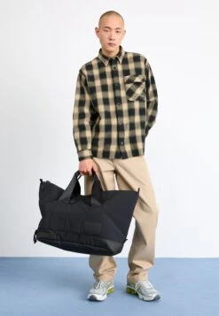 The North Face NEVER STOP WEEKENDER DUFFEL UNISEX - Weekend Bag - Black -The North Face 1905a4a105304d1daebf2926927eea1e