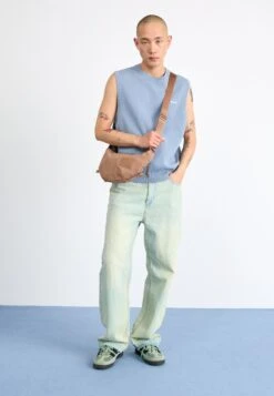 The North Face NEVER STOP CROSSBODY UNISEX - Cross Body Bag - Latte -The North Face 266c08cbc78c407da2b5844ba9e7b1b1