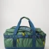 The North Face BASE CAMP VOYAGER DUFFEL 62L UNISEX - Sports Bag - Duck Green/shady Blue