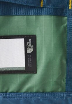 The North Face BASE CAMP VOYAGER DUFFEL 62L UNISEX - Sports Bag - Duck Green/shady Blue -The North Face 5d34b6ea6b994ce6a13de82c01bb9d7c