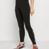 The North Face Zumu - Leggings - Trousers - Black
