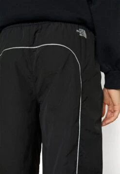 The North Face Piping Wind Pant - Tracksuit Bottoms -The North Face 77f10579a2a44aeab33bfd2755737426