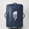 The North Face BASE CAMP VOYAGER 21 ROLLER UNISEX - Wheeled Suitcase - Shady Blue/summit Navy