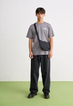 The North Face NEVER STOP CROSSBODY UNISEX - Cross Body Bag - Black -The North Face a8c4fbcca5264beaaf1b473eb0c4aa7c