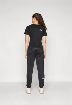 The North Face REAXION JOGGER - Tracksuit Bottoms - Black Heather -The North Face ba482b2c20744303821b314fd6e2cce9