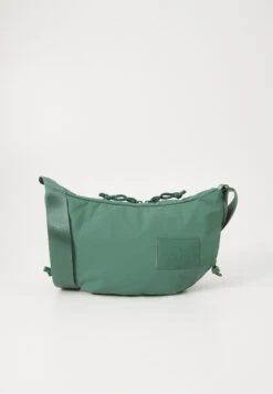 The North Face NEVER STOP CROSSBODY UNISEX - Cross Body Bag - Slate Moss -The North Face e1616a7ee0be4711aaf4657c435b99ee 1