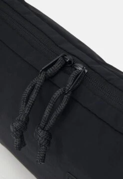 The North Face NEVER STOP CROSSBODY UNISEX - Cross Body Bag - Black -The North Face e59f87a10129440589699931bfc2c9f1