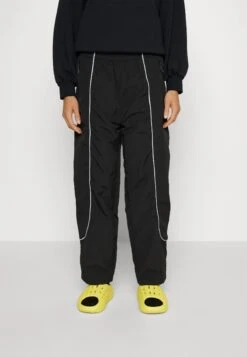 The North Face Piping Wind Pant - Tracksuit Bottoms -The North Face ef49f5442c2f4fdd8575c0aac27d559d