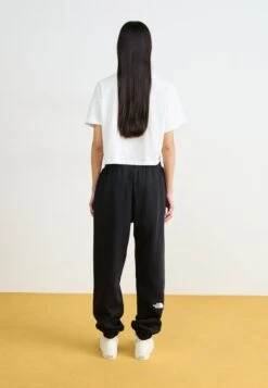 The North Face ESSENTIAL JOGGER - Tracksuit Bottoms - Black -The North Face ef93216acead46b188db74c35bb6dac9
