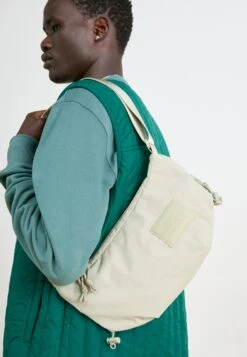 The North Face NEVER STOP CROSSBODY UNISEX - Cross Body Bag - Latte -The North Face f0e826683b984372824297e57fb9995e 2